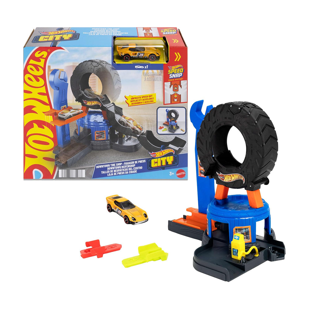 Hot Wheels City Downtown Tire Shop playset with rotating tyre ramp, vehicle lift and die-cast tow truck