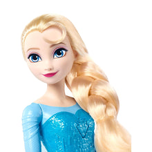 Disney Frozen singing Elsa doll in an ice-blue dress with a light-up skirt and braided hair