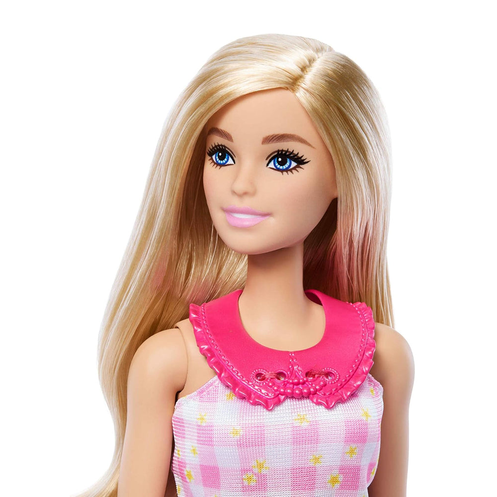 Barbie Easy-to-Dress blonde doll with five snap-on fashion pieces, pink handbag and hairbrush