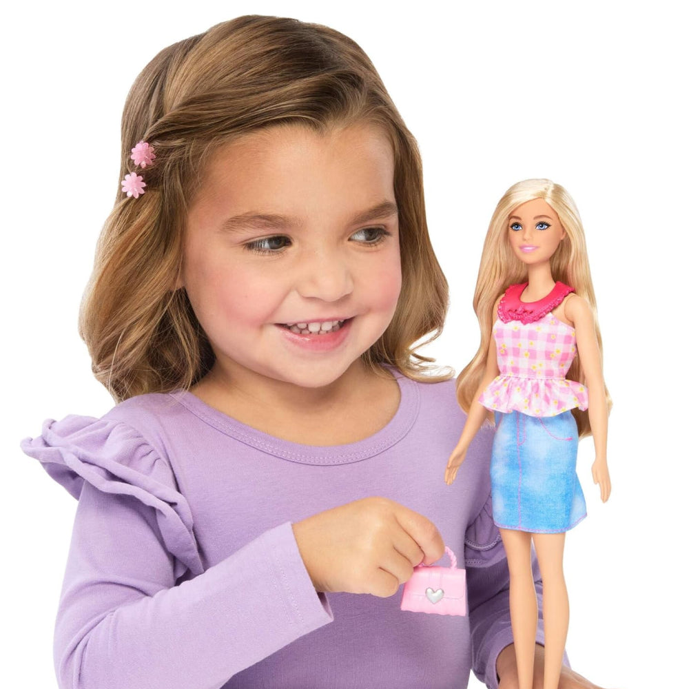 Barbie Easy-to-Dress blonde doll with five snap-on fashion pieces, pink handbag and hairbrush