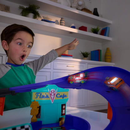 Disney Pixar Cars Lightning McQueen Celebration Raceway with light-up vehicle, loop-kicker and Flo’s V8 Café finish
