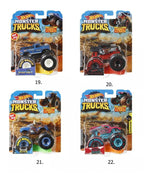 Four Hot Wheels Monster Truck packages on a white background