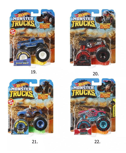 Four Hot Wheels Monster Truck packages on a white background