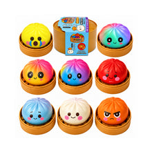 Nine cute, round, bun-shaped squishy toys arranged in a grid with their brown steamer baskets, alongside a blue and yellow product packaging card on a solid white background.