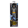 Toy figure of a superhero in packaging with visible branding on a white background