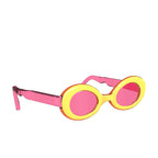 Pink and yellow sunglasses on a white background