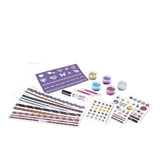 Collection of temporary tattoos, stickers, and other decorative items on a white background