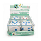 A retail display box containing four white squishy stress balls with colorful dots, under a mint green and white header card labeled 'Dice squishy'.